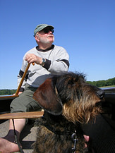 man, dog & canoe